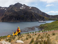 Quark Expeditions - Guests in landscape - South Georgia - Credit Sam Edmonds