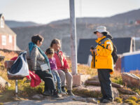 Quark Expeditions_Under the Northern Lights_Pax_Locals_Interacting_Ittoqqortoormiit_EastGreenland_acacia johnson