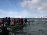 Waiting on a rocky Antarctic beach for the zodiac pick up_M & M van der Hulst